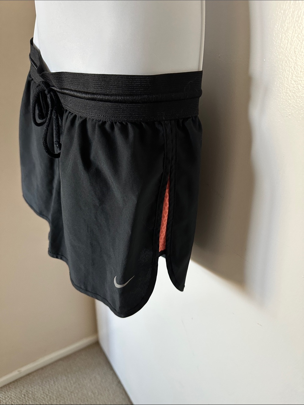 Nike Women’s Black Athletic Shorts with Coral Side Accent
